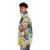 A puffer jacket featuring vibrant children's book covers, perfect for young readers. - men side left