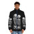 Model wearing dark, romantic puffer jacket with occult-inspired design featuring tarot cards, skulls, and flowers - men front