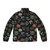 Puffer jacket featuring a lino print design of native Australian flowers such as wattle, protea, and flannel flowers