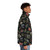 Puffer jacket featuring a lino print design of native Australian flowers such as wattle, protea, and flannel flowers - men side right