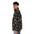 Puffer jacket featuring a lino print design of native Australian flowers such as wattle, protea, and flannel flowers - men side left