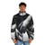 Stylish black and white latex puffer jacket with a striking shallow depth of field effect - men front