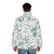 A green puffer jacket with a botanical eucalyptus leaves pattern, perfect for spring fashion. - men back