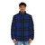 A cozy and stylish blue and black tartan plaid puffer jacket - men front