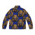 Blue puffer jacket with Isi Agu lion head design