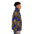 Blue puffer jacket with Isi Agu lion head design - men side right