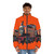 An orange puffer jacket inspired by Nia, the tank engine from the East Africa Railway - men front