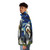 Bearded collie dog wearing a puffer jacket with a starry night design - men side left