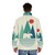 A person wearing a puffer jacket with a bear and geometric design in a snowy, mountainous landscape - men back