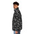 A stylish puffer jacket featuring a bold bandana print design - men side left