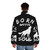 Person wearing a puffer jacket with a wolf design - men back