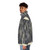 Gene Davis art-inspired puffer jacket featuring vibrant abstract patterns - men side left