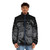 Dark puffer jacket with skull and reaper design, perfect for horror and goth fashion - men front