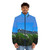 Man wearing an Alaska puffer jacket standing in front of the Mt. Marathon in Seward, Alaska - men front