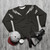 Metallic silver sweatshirt with lightning bolt zap design - flat lay