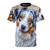 A stylish t-shirt featuring an illustration of an adorable Australian Shepherd dog with its distinctive shaggy coat and expressive eyes.