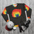 Vibrant rainbow cats sweatshirt - flat lay
