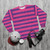 Cheshire Cat Striped Sweatshirt in Pink and Purple - flat lay