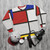 Piet Mondrian inspired geometric sweatshirt with primary colors - flat lay