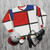Mondrian-inspired de stijl sweatshirt with primary colors and geometric patterns - flat lay