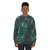 Dark green palm leaves pattern printed on a cozy sweatshirt - women
