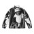 Puffer jacket featuring an illustration of the chimpanzee astronaut Ham the Chimp in a NASA space suit - Back