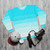 Blue sweatshirt with ombre paint strokes design - flat lay