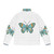 Woman wearing a puffer jacket with a monarch butterfly charm design - Back