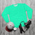 Bright neon turquoise color graphic design sweatshirt - flat lay