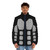 A man wearing a navy blue men's puffer jacket with the Sabaton logo - men front