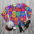 Retro floral hippie sweatshirt with colorful vintage-inspired flower design - flat lay