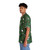 Model wearing a colorful lemur pattern Hawaiian shirt - People Left