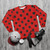 Oversized black and red polka dot sweatshirt - flat lay