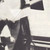 John Waters wearing a black and white Hawaiian shirt - Detail
