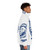A puffer jacket featuring a lion head design and the text "Detroit Lions" on a background of urban decay - men side right