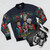 Golden Christmas bomber jacket with classic retro and ugly sweater design - Flat lay