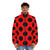 Woman wearing a red and black polka dot lady bug puffer jacket - men front
