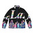 Colorful puffer jacket with "It's a Sin" print, representing LGBTQ+ pride and friendship in Los Angeles