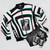 Persona 4 Midnight Channel Bomber Jacket with a 3D effect, spiral, and Japanese katakana design - Flat lay