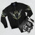 A stylish bomber jacket featuring the iconic paladin shield design from the popular video game Final Fantasy XIV. - Flat lay