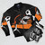 A bomber jacket featuring a graphic design of a shark playing soccer. - Flat lay