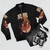 A bomber jacket featuring a street fighter-inspired "shoryuken" ramen noodle design - Flat lay