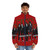 A red puffer jacket with the iconic Kiss band logo and makeup design - men front