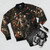 Cosmic floral bomber jacket with surreal space and flower design - Flat lay
