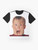 Macaulay Culkin wearing a red shirt in the iconic "Home Alone" movie poster graphic on a t-shirt - Flat lay