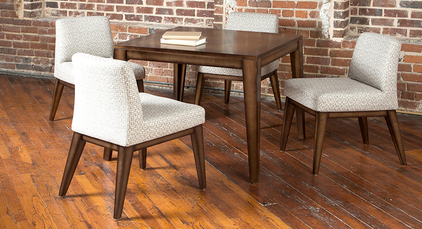California House C2000 chairs around a game table in a brick-walled room