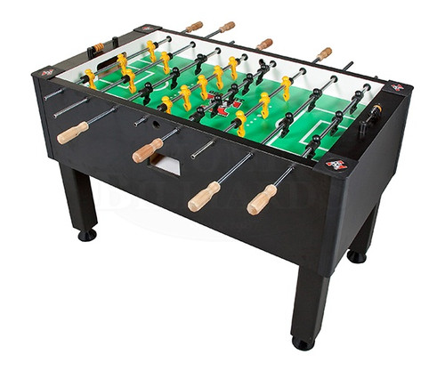 Black foosball table with green playing field, yellow and black players, and wooden handles, angled view.