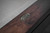 Olhausen Heritage collection emblem on wooden pool table with grey felt and Olhausen brand emble.