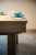 Close up of the Canada Billiards Euro Pool Table with dining table top with aqua blue plates, bowls and cups set on the table.
