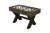 Rustic wooden foosball table with metal rods and players, supported by sturdy trestle-style angled base.